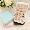 Travel Jewelry Organizer Box with Ring Slots and Necklace Storage Compartments